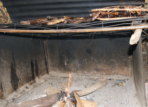 Traditional fish smoking system
